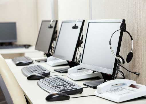 headsets, computers, and communication solutions in modern contact centers