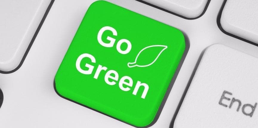 Switching to VoIP helps businesses become more environmentally responsible. go green keyboard button