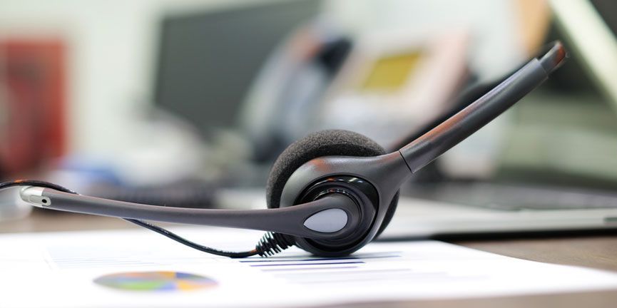 office employee or receptionist headset on desk