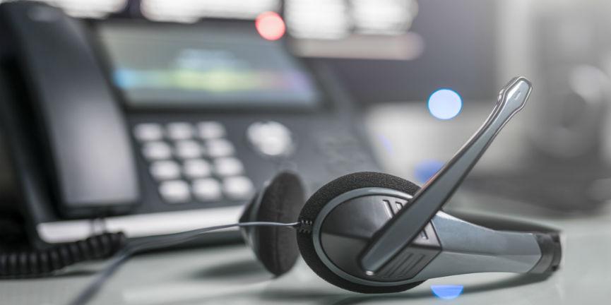 voip phone and headphone in office