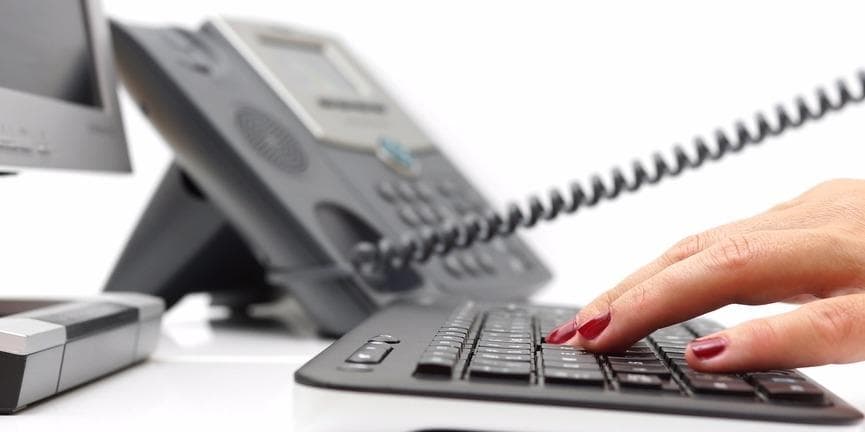 Call recording is one of the most useful VoIP phone tools for businesses. telephone and keyboard