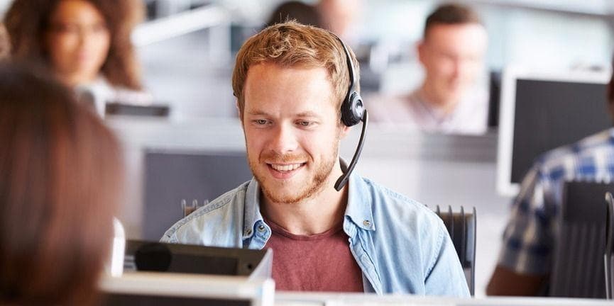 Avoid losing customers over the phone by being courteous, never missing a call, and using hold music wisely, among other tips. employee talking to clients on the phone