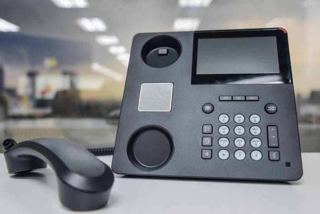modern ip pbx phone on table