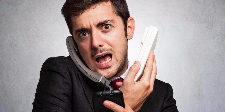 stressed employee answering calls