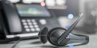 This month's telecom news roundup includes stories from Avaya, Genesys, One Ring Networks, Windstream Enterprises, Mitel, and netsapiens. voip phone and headphone in office