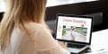 Ecommerce shop owners often think they no longer need a business phone and that they can simply communicate via chat or email. Nothing could be further from the truth. woman browsing ecommerce website