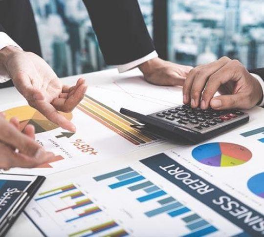 accountants working with calculator