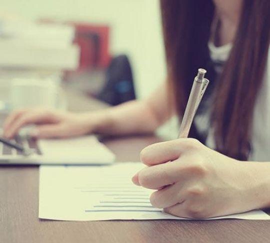 student taking test at a university