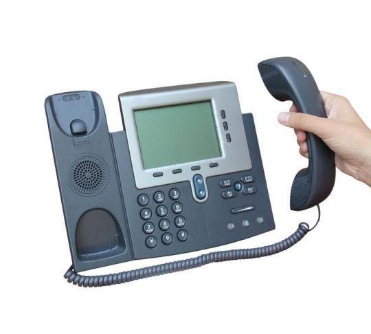 employee using ip phone for calling