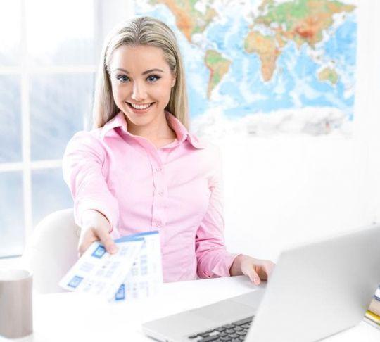 employee at a travel agency desk